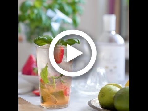 Hernö Strawberry Basil Smash: Muddle 1/2 lime, 1 strawberry and 3 basil leafs in a highball glass. Add 20 ml simple syrup, 50 ml Hernö Old Tom Gin and 60 ml Soda Water. Fill glass with ice and stir. Garnish with strawberries and basil leafs.