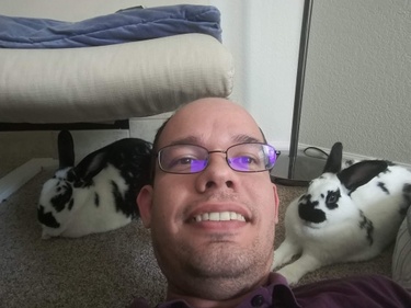 Before Mariel officially moved to Pueblo, Kenn had the bunnies to himself for a couple weeks. 
