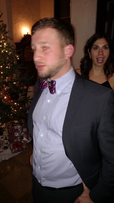 Our first known photo together at the Wisconsin School of Business winter social. We would get better at this eventually. 