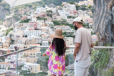 Setting the Scene: James told Charise they were heading to a casual lunch on the terrace of their hotel and suggested they walk over to the balcony to take in the view.