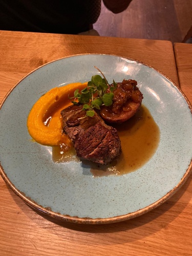 Roast rump of lamb, potato fondant, red onion marmalade & carrot puree