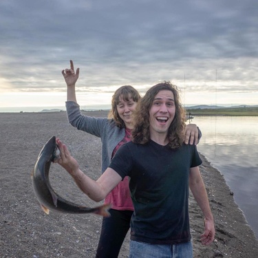 Rick finally caught a fish!!  Midnight fishing in Nome, AK