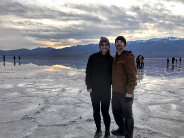 Standing at the lowest point in the US, Badwater Basin in Death Valley National Park.