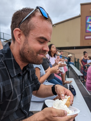 Otto enjoying a Cream Puff at the Wisconsin state fair