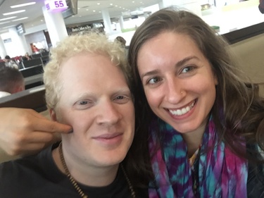 At SFO on our way to EDC! Louis learning to smile / take selfies with some pro tips (ha get it) from Laura