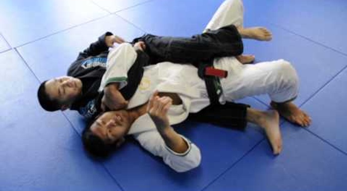 BJJ: Learn 3 ways of escaping the back-take and finishing on the arm triangle