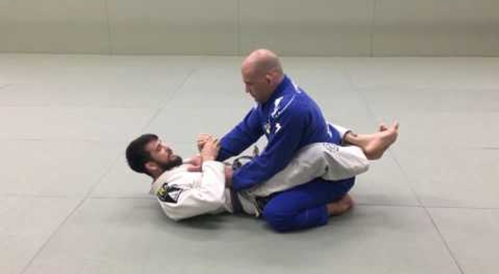 BJJ lesson: Michael Langhi teaches how to sweep from the closed guard and finish on the armbar
