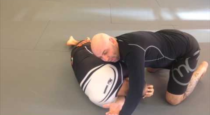 BJJ: Learn how to sink the inverted arm triangle from the knee-on-belly