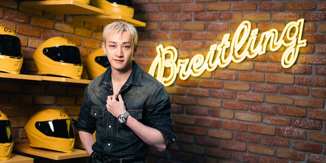 Stray Kids’ Bang Chan greets fans & takes the wheel at Breitling’s Singapore pop-up