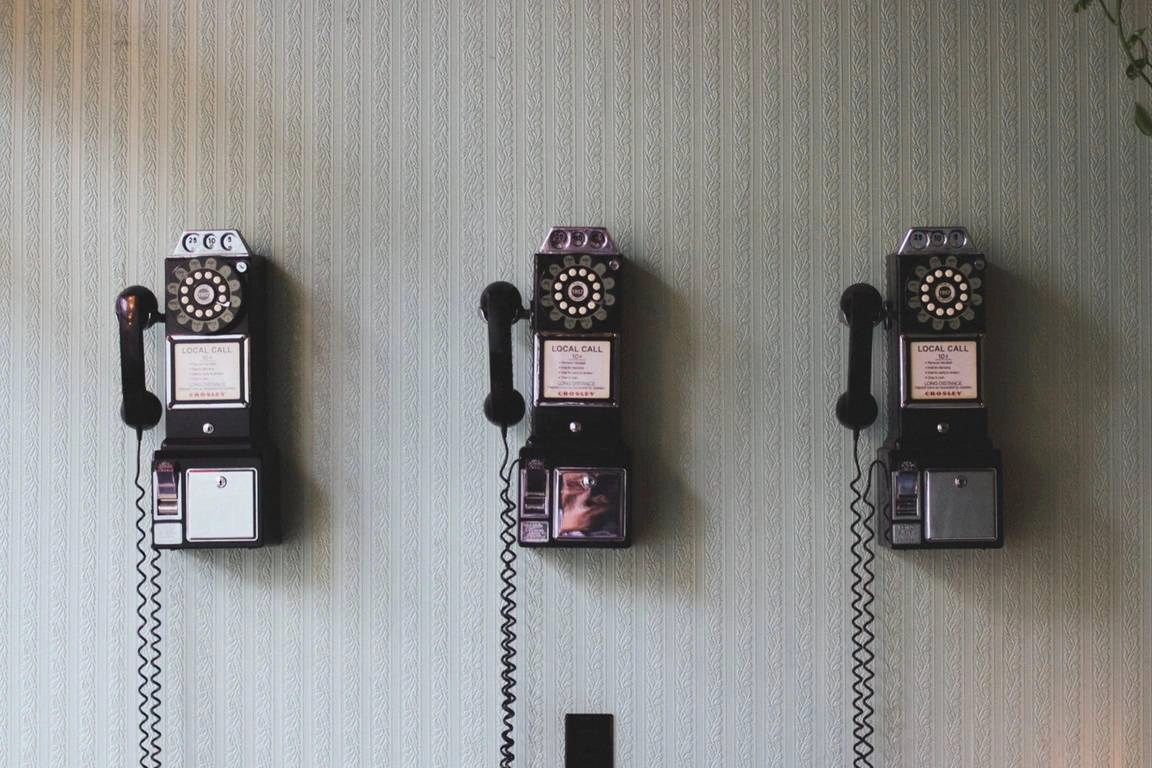 Three telephones.