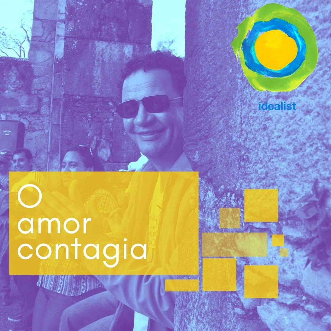Ênio Reis smiling in a technicolor picture with the words,"O amor contiga" imposed over him.