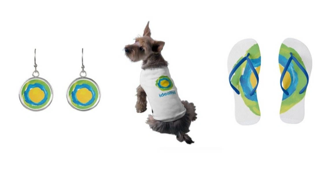 A pair of earring, a dog in a shirt, and a pair of flip flops, all with the Idealist logo.