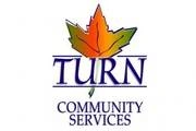 Logo de TURN Community Services