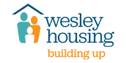 Logo of Wesley Housing Development Corporation