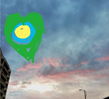 A painting of the Idealist logo in the sky.
