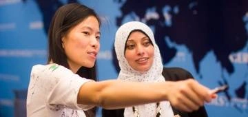 Two teachers help each other learn