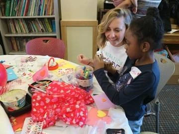 volunteer and child
