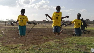 Smile children rope skipping at Jacaranda grounds which is a walking distance from our home in soweto slums