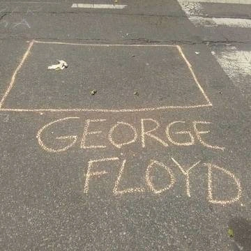 A square that says George Floyd underneath it.