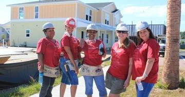 Group of female volunteer smile on construction site