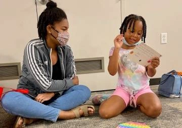 The Youth Literacy Program works with two local after-school programs that serve mostly children of color.