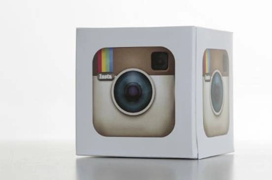 A cube with Instagram's logo.