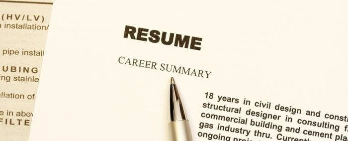 Close up of a resume with a pen pointing to the word Career Summary.