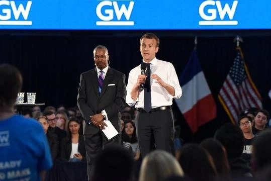The Elliott School's Dean Reuben Brigety with French President Emmanuel Macron at a GW Town Hall