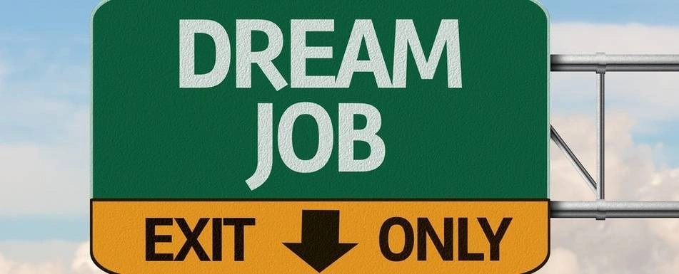 A road sign saying 'Dream Job'.