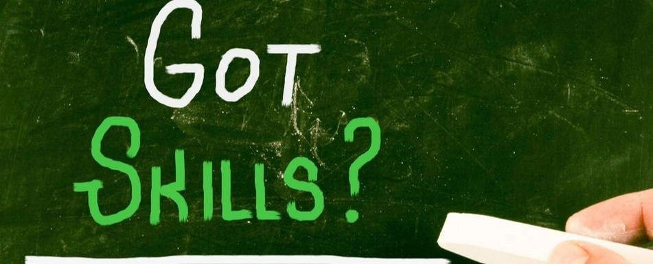 A chalkboard that says 'Got Skills?'