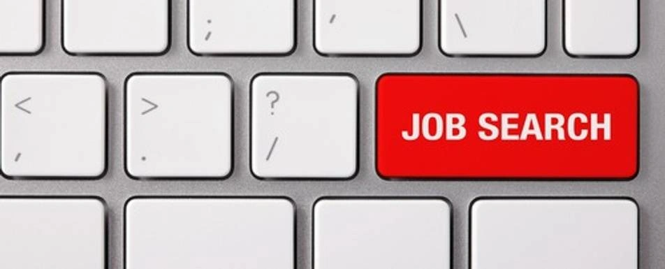 A keyboard with one red key saying 'Job Search'.