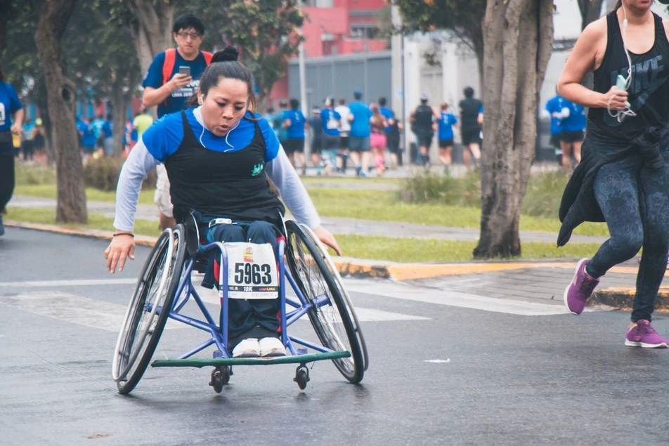 woman in wheelchair marathon