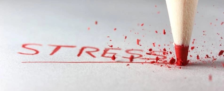 A crayon writing 'stress'.