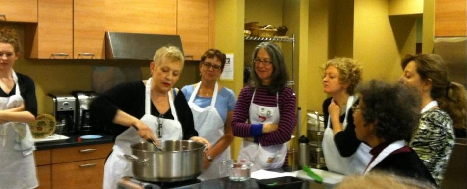A group of people in a cooking class.